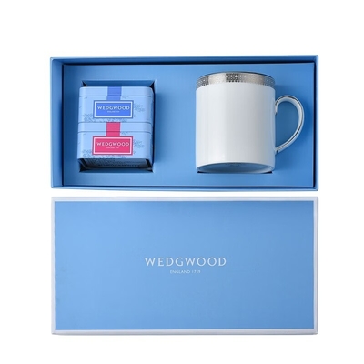 Verras uw klanten met deze platina kant mok en draagbare theeglas cadeaubon set