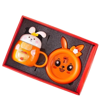 Verzamelbare schattig konijn geïmprimeerde thermostatische cup set verwarming warme cup en warme coaster