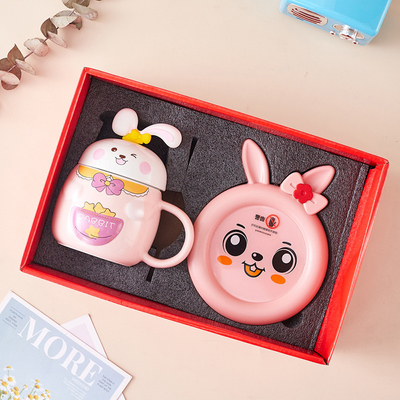 Verzamelbare schattig konijn geïmprimeerde thermostatische cup set verwarming warme cup en warme coaster