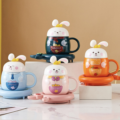 Verzamelbare schattig konijn geïmprimeerde thermostatische cup set verwarming warme cup en warme coaster