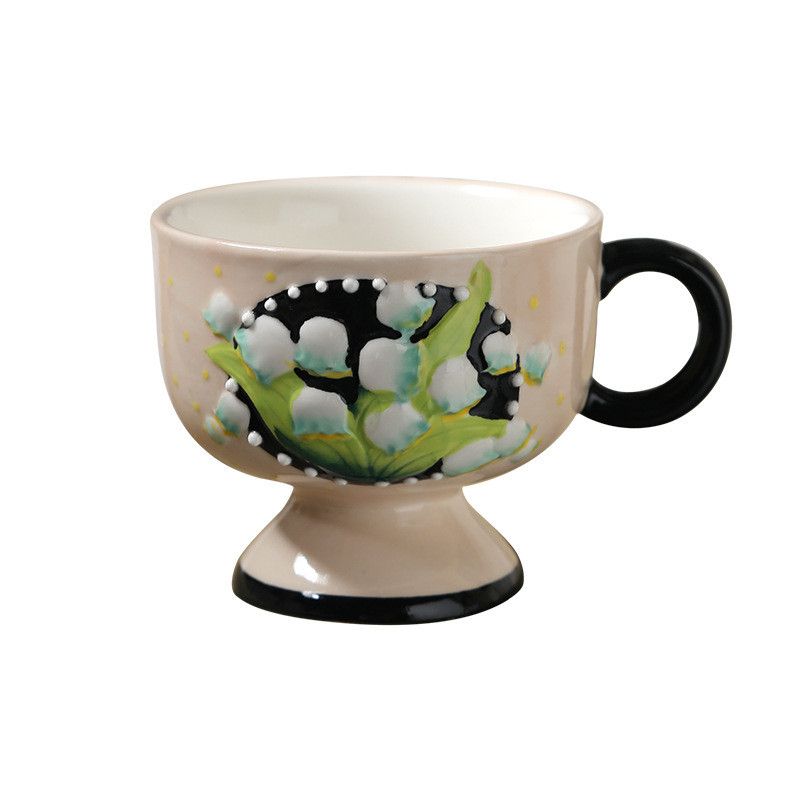 Reisbureau Essentials Handgeschilderde lelie van de vallei Keramische koffiebeker uit Finland